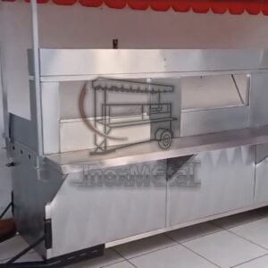 el carrito taquero de alto impacto con lona naranja. doble vaporera y capacidad de producción en serie